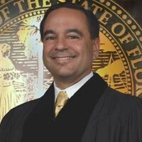 Honorable Carlos Guzman